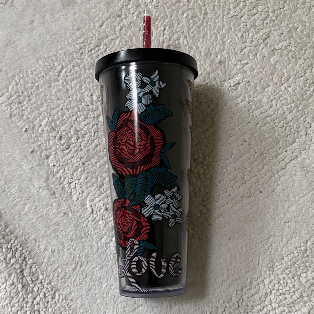 Black Tumbler with Floral Design and Straw